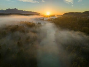 image of fog between mountains at sunrise