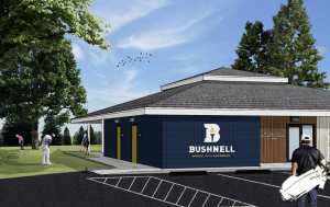 computer rendered image of a building with the Bushnell logo, next to a golf course parking lot and players practicing putting