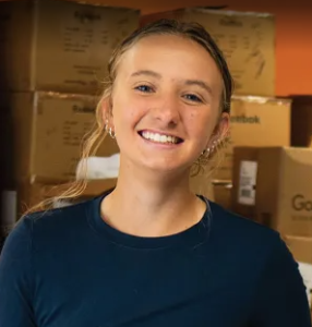 avery lenssen looking at camera while smiling