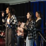 Worship Arts students sing as members of the Bushnell University worship band during chapel