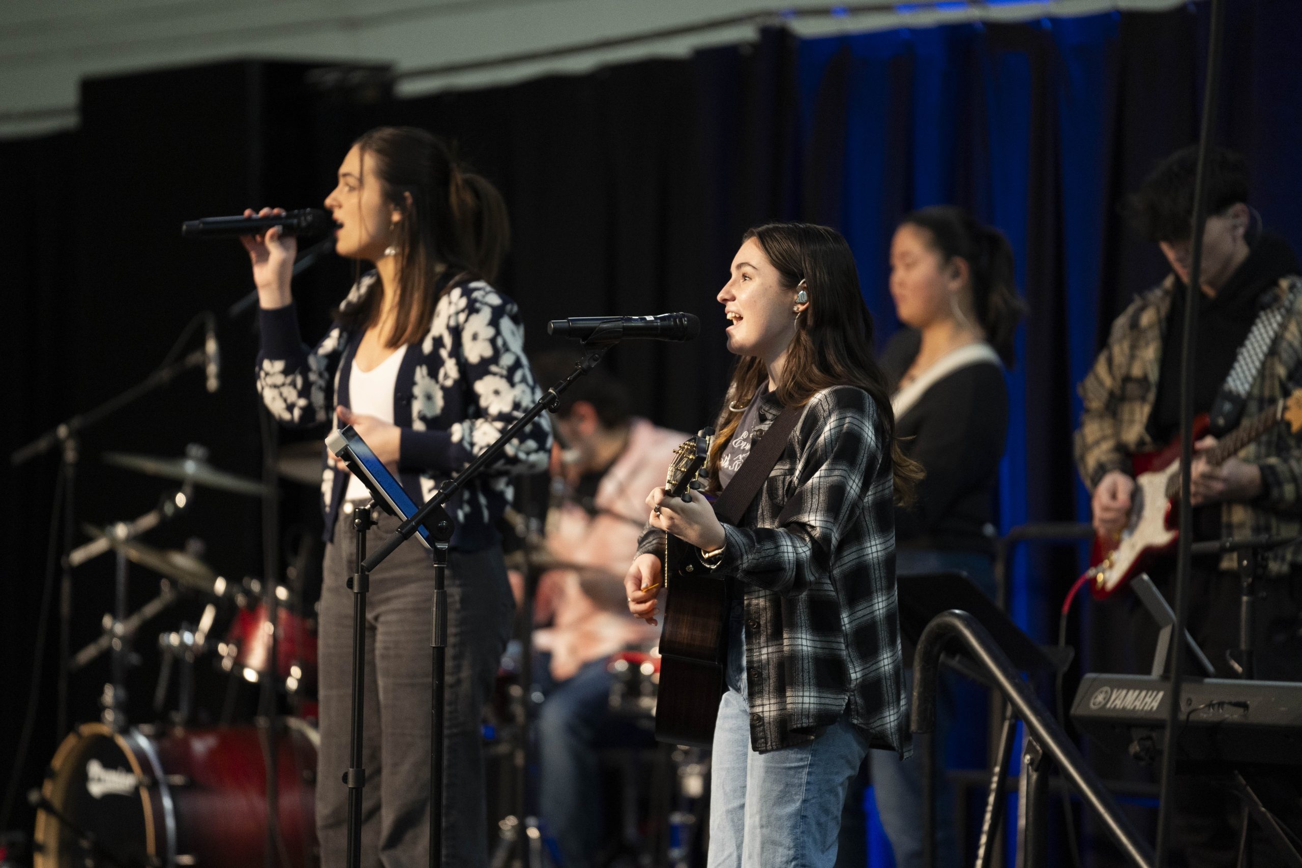 Worship Arts students sing as members of the Bushnell University worship band during chapel