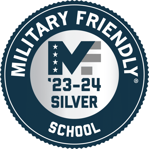 Round navy and silver logo with words "Military Friendly School, '23-24 Silver"