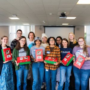Bushnell University students gather after participating in a service-learning project supporting children through Operation Christmas Child.