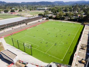 Aerial view of Bushnell University's Morse Choice Athletics Center soccer field during competition.