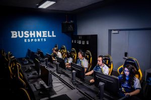 Bushnell University's Esports Arena featuring competitive gaming stations and team seating.