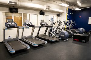 Cardio equipment inside Bushnell University's Fitness Center.