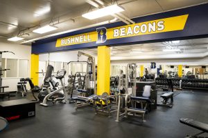 Strength and conditioning equipment inside Bushnell University's Fitness Center.