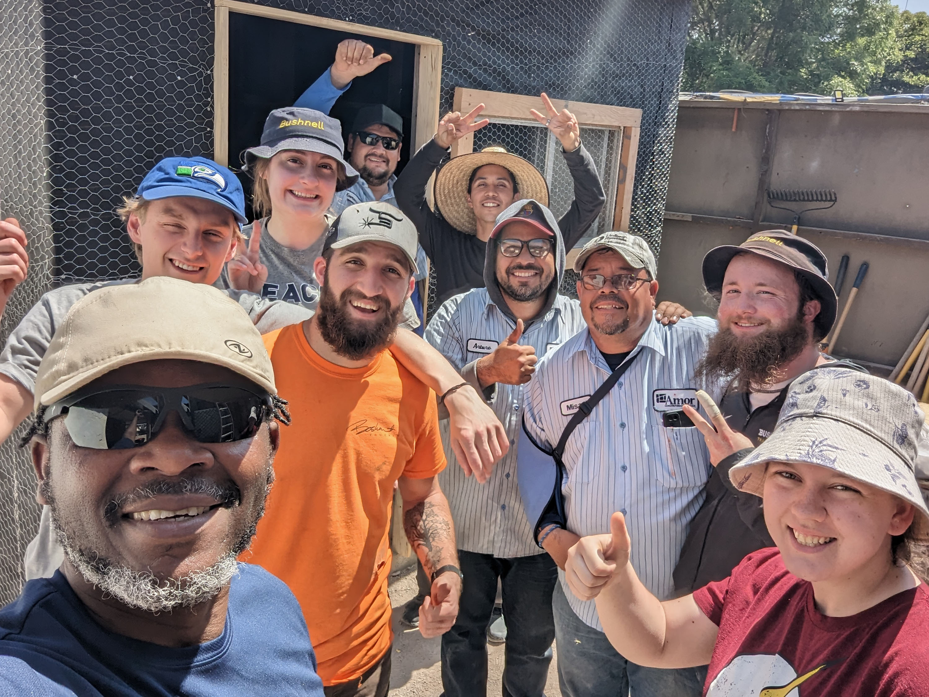Mexico mission team celebrates successful completion of a house with Amor members.