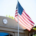 American flag displayed on Bushnell University's campus in support of military and veteran students.