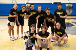 Bushnell University students celebrate after winning an intramural basketball championship in the Morse Center.
