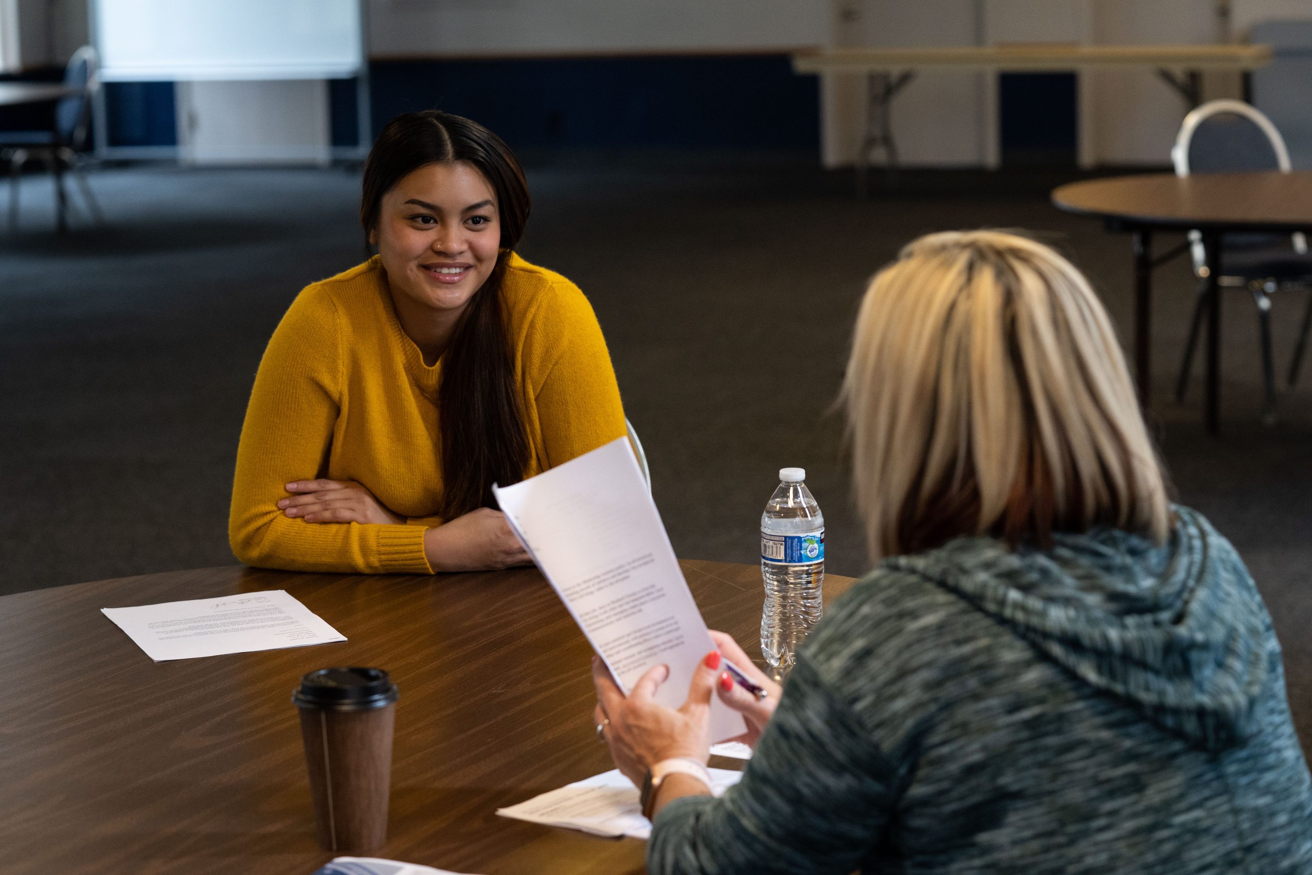 Bushnell University student meeting one-on-one with a staff member for academic and career support.
