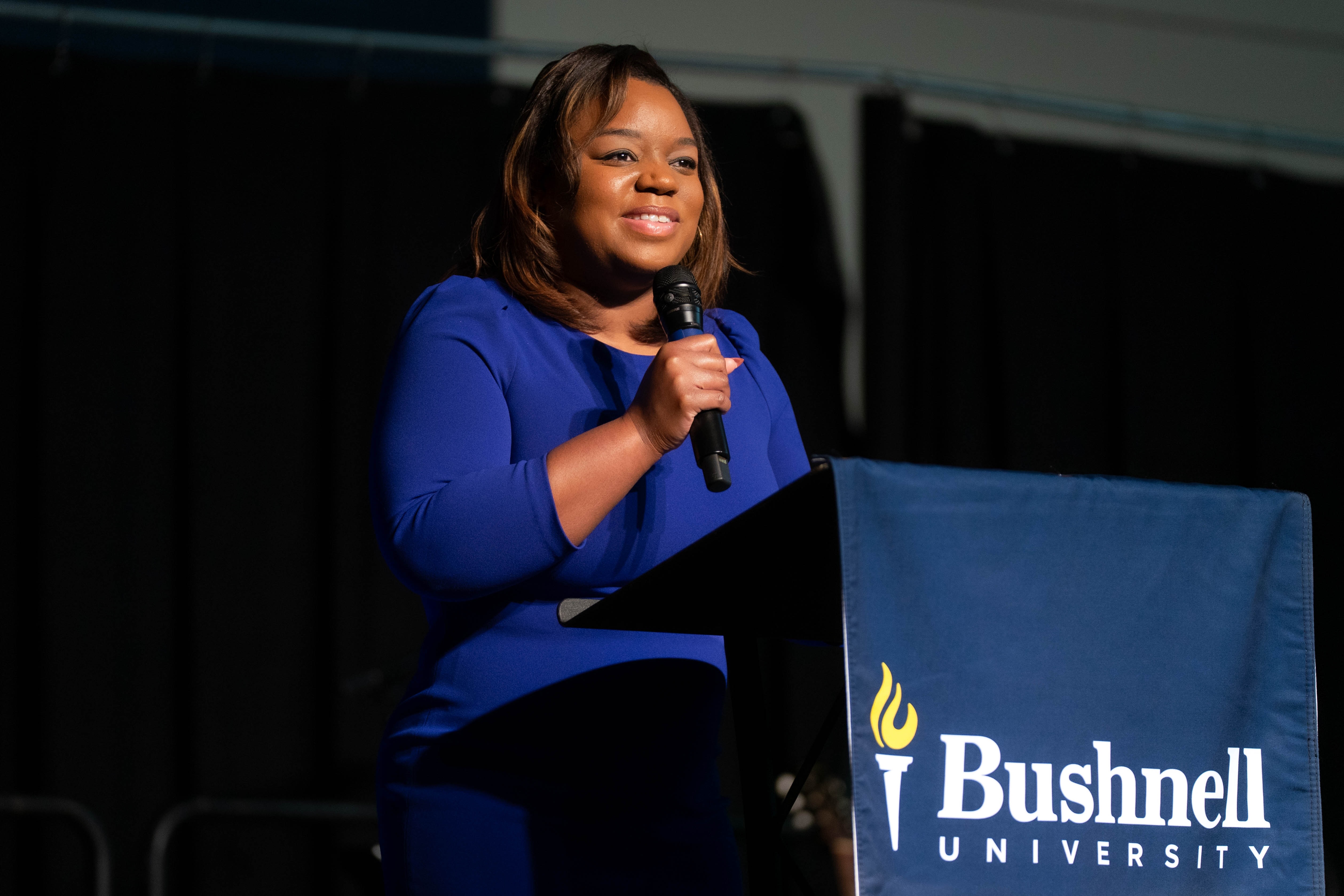Lisa Fields addresses attendees during a Bushnell University gathering.