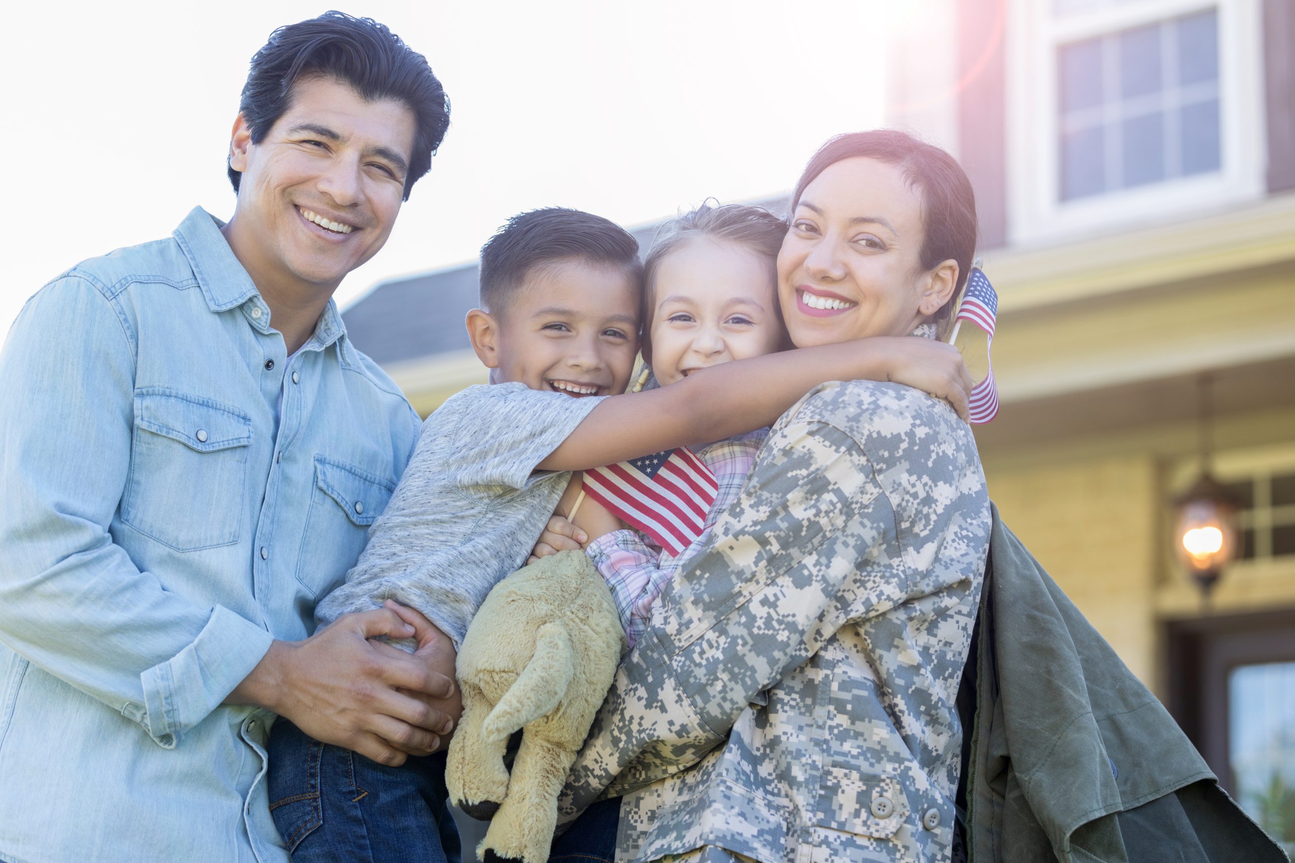 Military family celebrates a service member's return home.