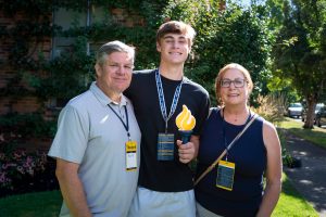 A new Bushnell University student poses with family during New Student Orientation