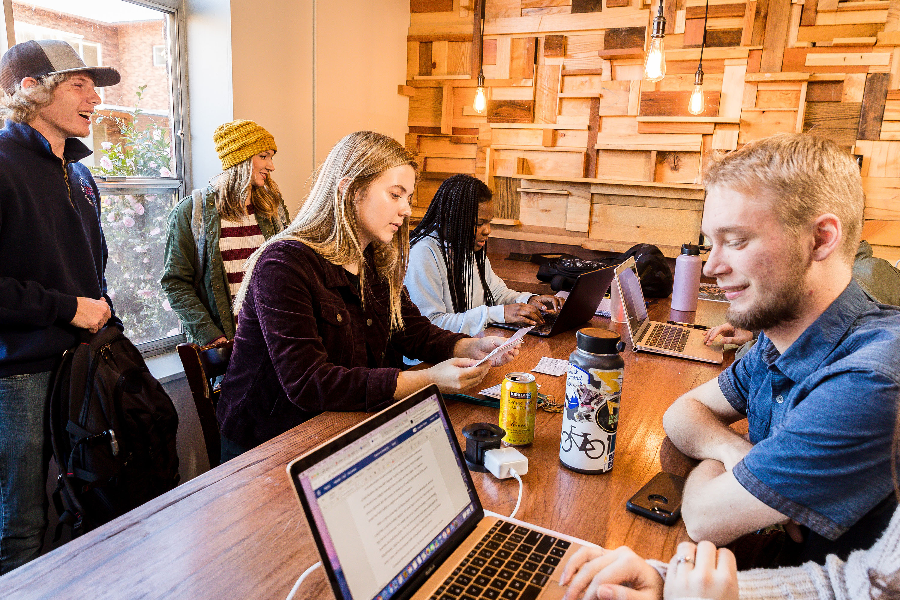 Non-degree academic students studying together as a group in a common space.