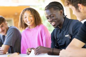 Bushnell students on campus, representing the next generation of leaders the scholarships support