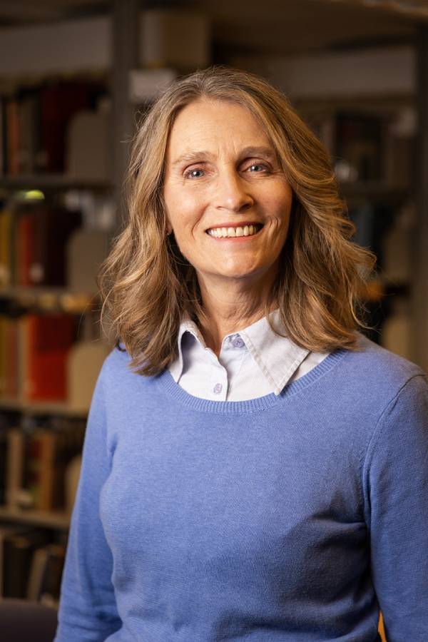 Headshot of male professor in studio