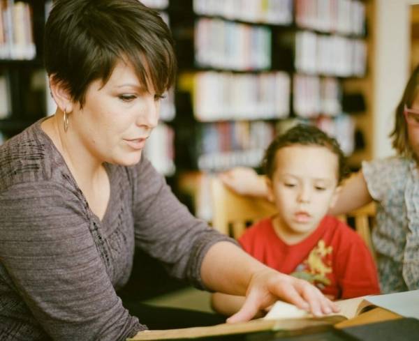 person reading to a child