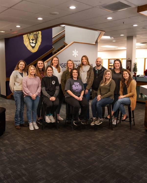 A group of Bushnell University alumni posing for a photo